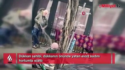 Evsiz kadını hortumla ıslattı