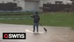 Man in Santa Barbara County seen using paddleboard as flash floods prompt mandatory evacuations