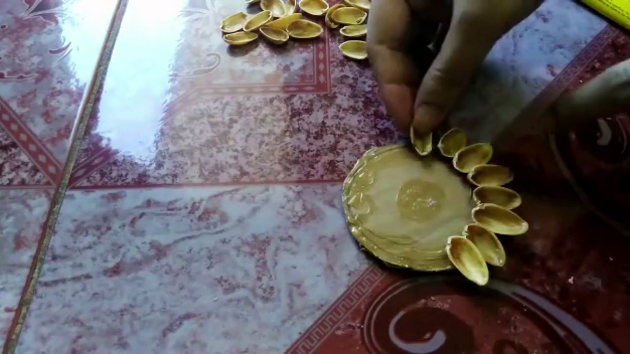 Handmade wallhanging with old wheel cap