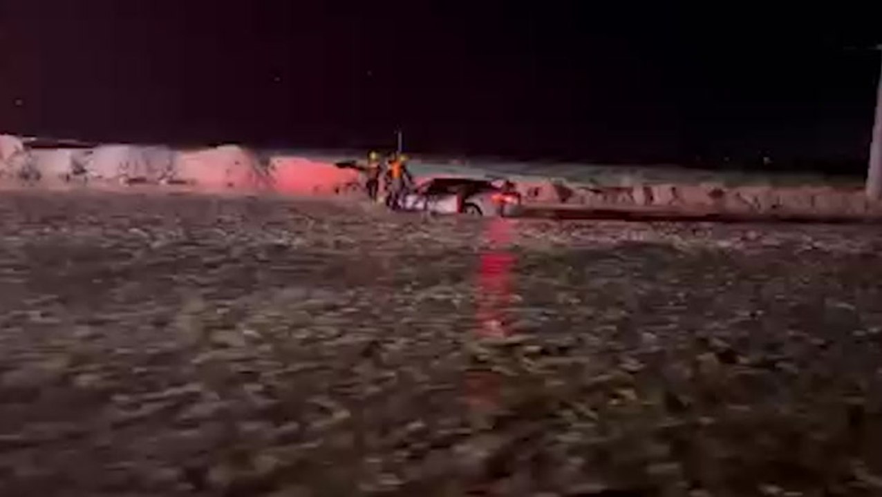 Trapped motorist rescued from floodwater in California desert city of Palm Springs