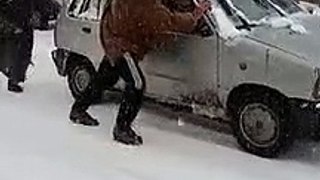 People struggle to drive in freezing temperature in Kashmir