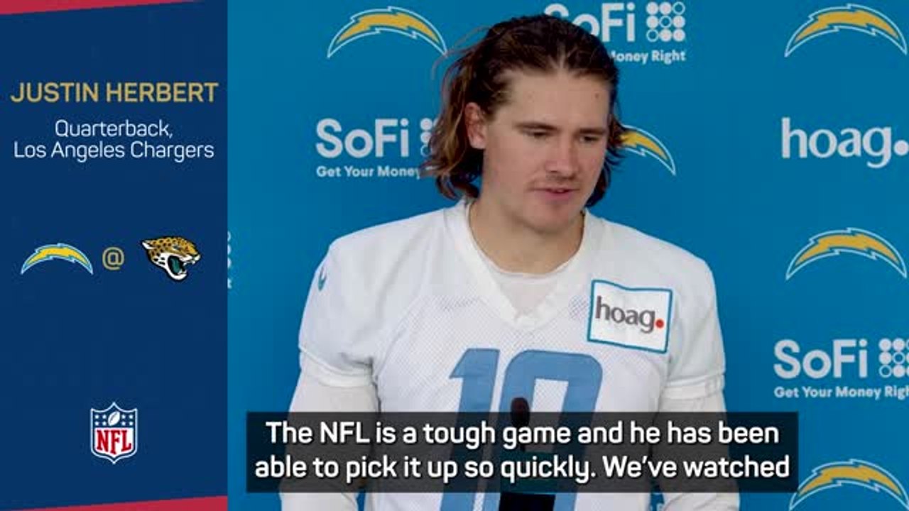 A showdown of playoff first-timers in Justin Herbert and Trevor Lawrence