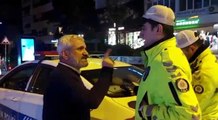 Kadıköy'de ceza yazan polise 'İnsan olalım' diyen taksici, tepki görünce 'Hepimiz kardeşiz' diyerek geri adım attı