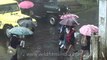 School children under colorful umbrellas in Cherrapunji