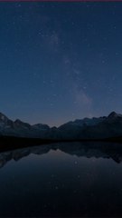 Beautiful Timelapse Of The Night Sky With Reflection in the