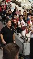 Coach Tim Cone welcomed by fans as he enters the court while Ginebra practices