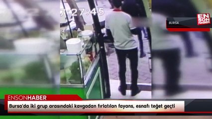 Bursa'da iki grup arasındaki kavgadan fırlatılan fayans, esnafı teğet geçti