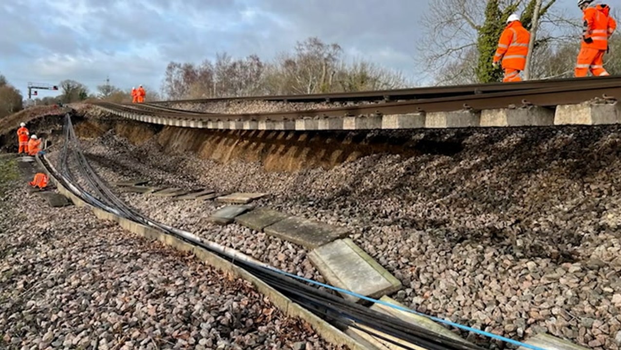 Train passengers warned of major disruption after ‘huge’ landslip leaves track hanging