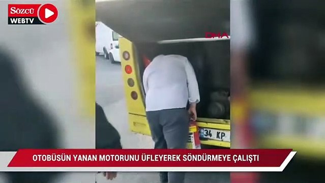 Otobüsün yanan motorunu üfleyerek söndürmeye çalıştı