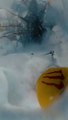 Watch as a skier falls into a glacier 