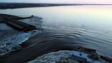 Water gushes through damaged dam as Ukraine accuses Russia of blowing it up