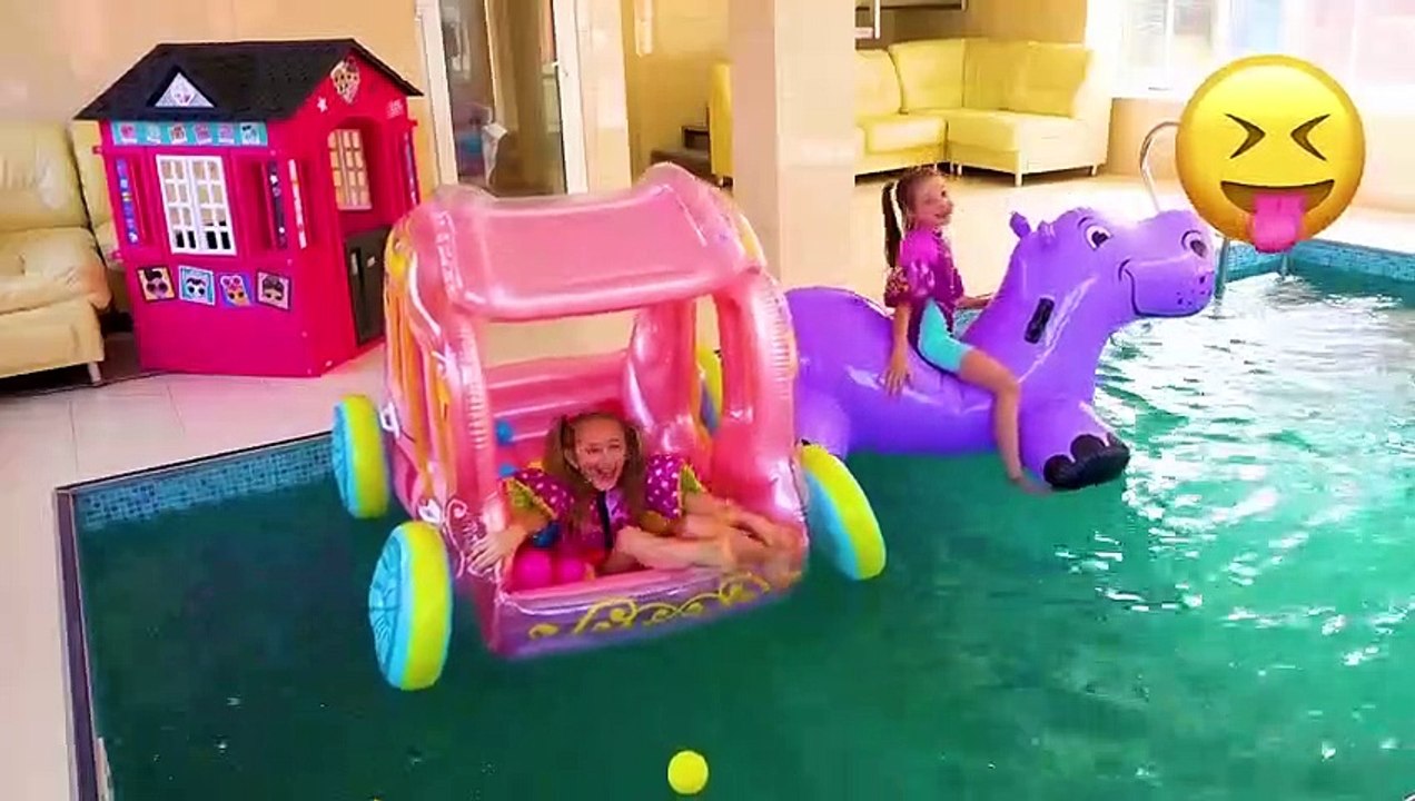 Sasha plays with Water Slides and finds inflatable Toys in Surprise Eggs