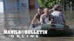 Kherson locals flee flooded homes after Ukraine dam destroyed