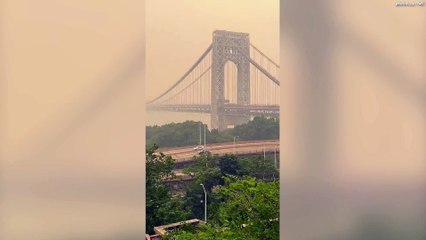 Video shows George Washington Bridge in NYC shrouded in orange smog