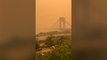 Watch: New York City bridge obscured by eerie haze from Canada wildfires