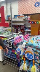 Security Retrieves Merchandise Amid Public Freakout