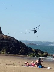 Chinook helicopter flies over Tenby