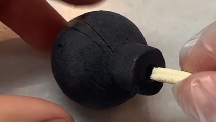 Women makes heavenly chocolate and jam-filled Bombons that look like cartoon bombs