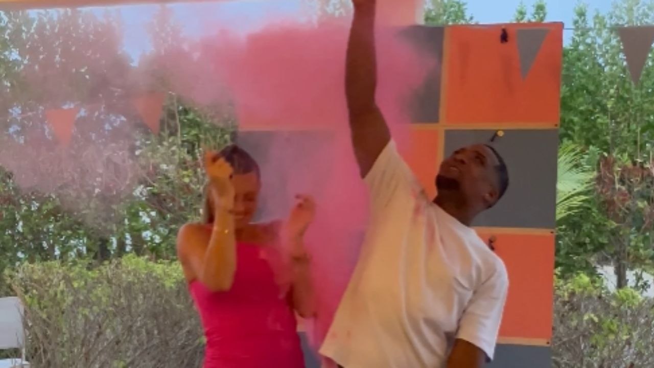 Loving couple pop the gender reveal balloon to find they are having a girl *Wholesome Gender Reveal*
