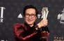 Ke Hu Quan tries not to cry upon accepting his Critics' Choice Award