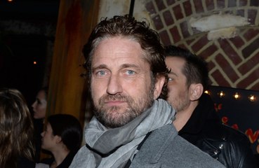 Gerard Butler wants 'dark satire' in the future