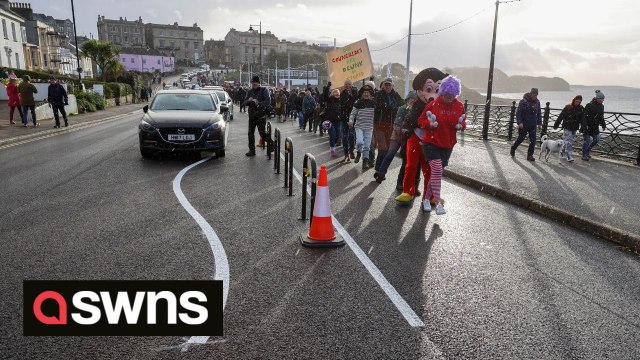Residents stage CONGA protest against council painting 'Britain's most bonkers road markings'
