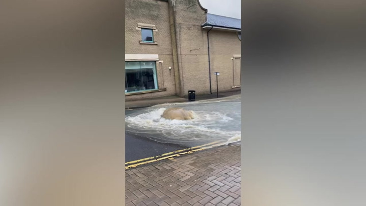 Hastings: Road flooded as water gushes from drain close to shopping centre