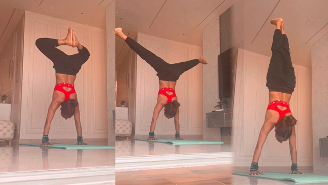 Nia Sharma Balancing Workout, उल्टा होकर पैरों से किया नमस्कार Watch Video | Boldsky *Entertainment