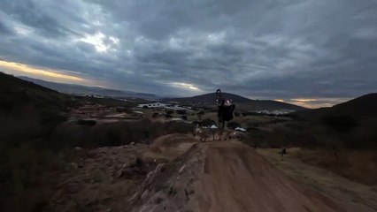 Rider Does Tricks While Riding Bike on Track - 1389498-2
