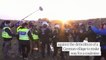 Riot police carry Greta Thunberg away from German coalmine protest