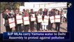 BJP MLAs carry Yamuna water to Delhi Assembly to protest against pollution
