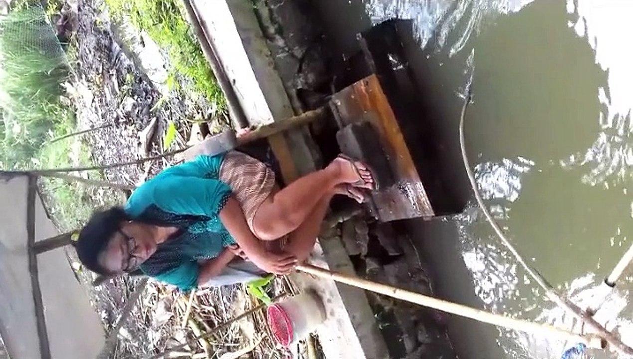 Trapping small fish in the river