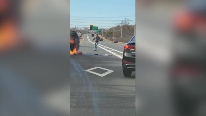 Heroic motorists rescue woman from burning vehicle on New York expressway