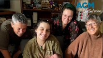 Queensland mum gives birth while trapped in flooding home