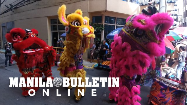 Lion dancers performs along Ongpin to celebrate the year of the Rabbit this Chinese New Year 2023