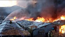 Incêndio de grandes proporções queima 60 casas na capital da Coreia do Sul