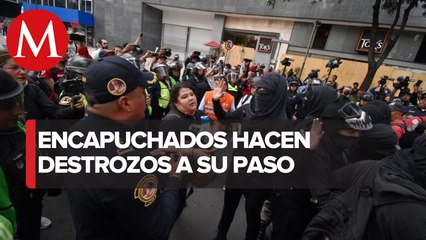 Avanza la marcha en contra de GN en el metro de la CdMx; reportan destrozos