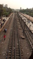 Extremely Crowded Train Pulls Into Station