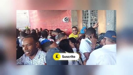 Varias mujeres provocan desorden en la entrada de la Basílica donde estaba Abinader