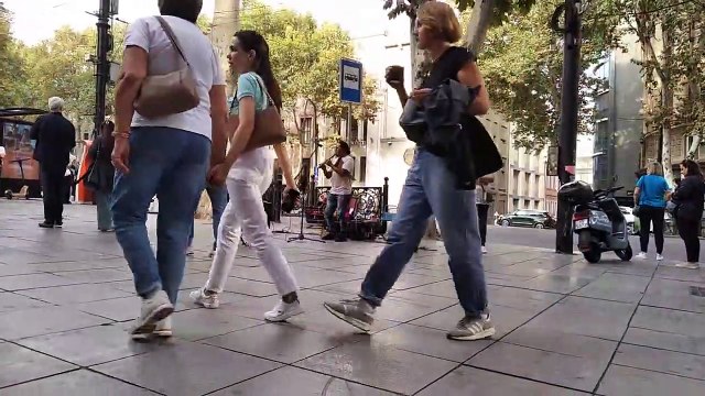 Awesome wind-instrument street musician in the streets of Tbilisi (Georgia)