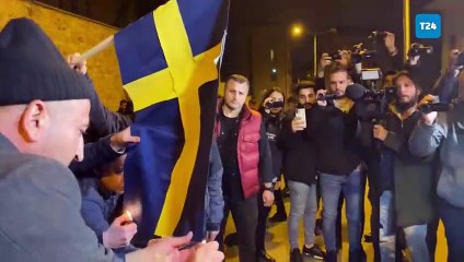 Kuran-ı Kerim yakılmasına konsolosluk önünde tepki: Bir gece ansızın Stockholm'e geliriz!