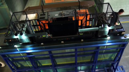 Strange Logistics Vehicles in a Glass Factory