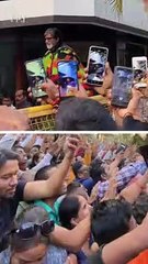 Amitabh Bachchan greets fans with folded hands outside his Mumbai residence