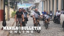 Erden Eruç, the 15-time Guinness World Record holder, attempts to ride a bamboo bicycle