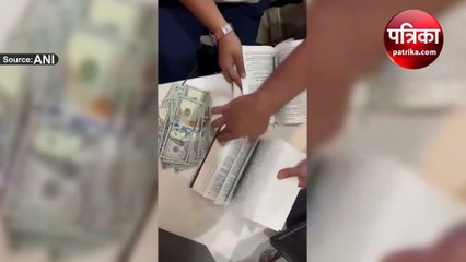 किताबों से निकले 90,000 डॉलर और 2.5 किलो सोना, देखें वीडियो