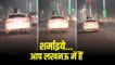 Lucknow: चलती कार के सनरूफ को खोलकर रोमांस करता दिखा कपल, Video हुआ वायरल