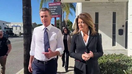California Governor Newsom surrounded by armed security