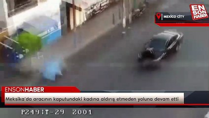 Meksika’da aracının kaputundaki kadına aldırış etmeden yoluna devam etti