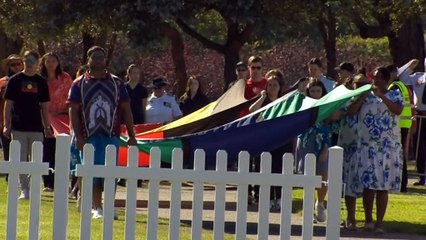 Canberra's national flag-raising and citizenship ceremony has been held this morning