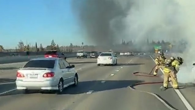 Smoke billows from Tesla after it ‘spontaneously’ catches fire